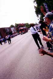 St. Louis Fire Chief Sherman George and Police Chief Joe Mokwa leading Sodomite parade with police officers in background holding hands