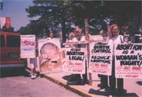 Hunter, Daniel, and Angela Michael confronting pro choice league outside NRTL convention.